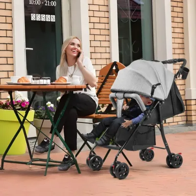 Poussette de voyage pliable grise, dossier réglable